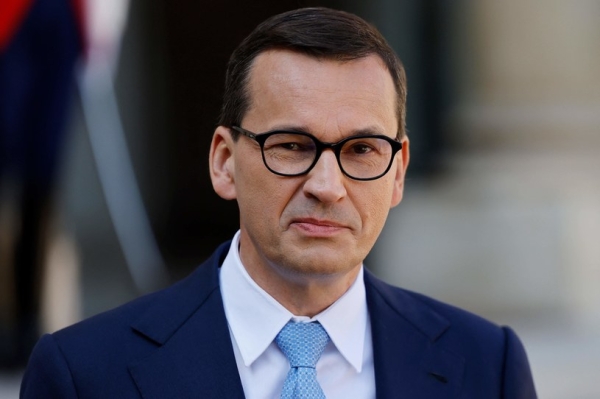 Premier Mateusz Morawiecki przewiduje, że stopy procentowe będą spadać /AFP