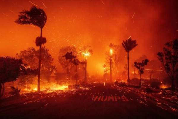 Wildfires in the western United States, such as the one pictured earlier this year in Los Angeles, have contributed to global warning, according to researchers. Photo via Los Angeles County Fire Department/UPI