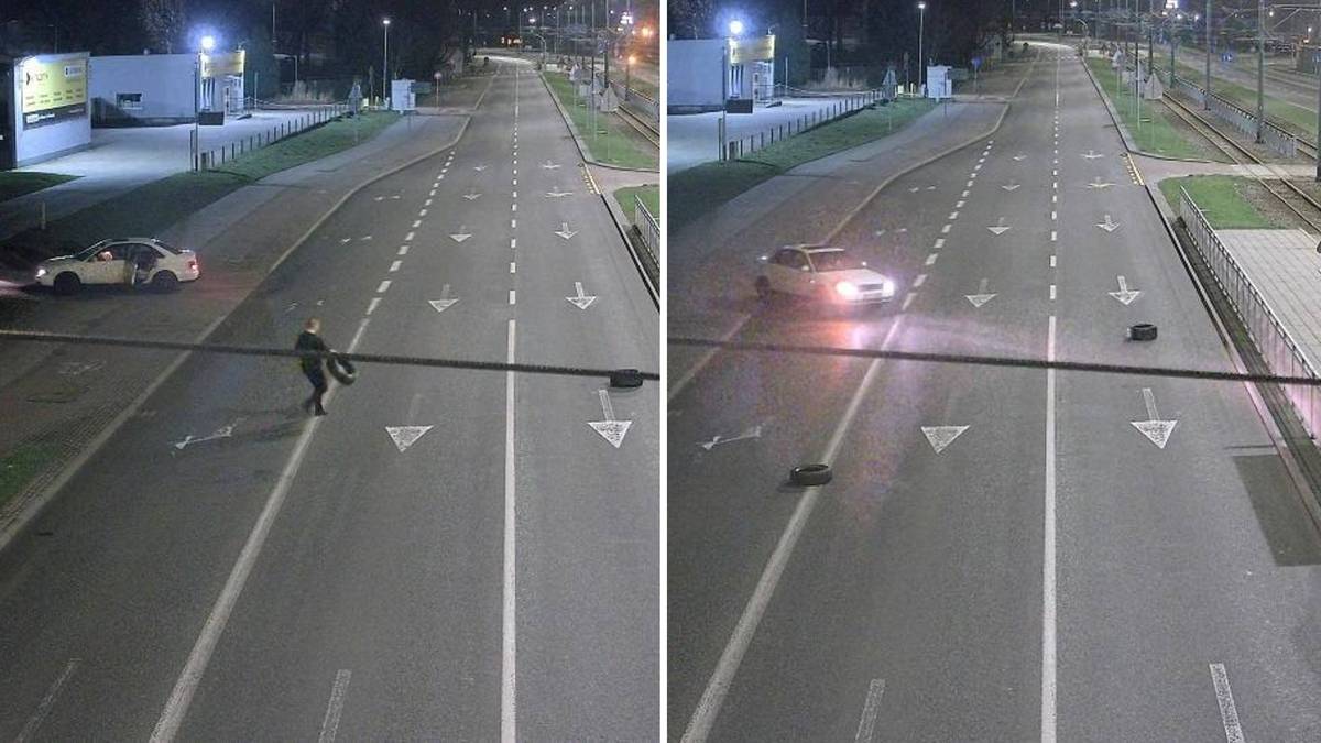 Ujęcie z monitoringu pokazujące mężczyznę kładącego opony na drodze.